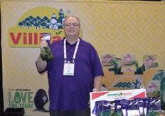 Proudly showing a mesh bag of avocados is Wayne Marshall with Villita Avocados.