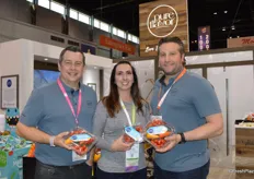 Chris Veillon, Melissa Moore and Jamie Moracci with Pure Flavor show the company’s newest snack pack that includes tomatoes, mini cucumbers and sweet mini peppers.