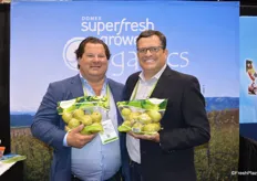 Paul Newstead and Mike Preacher with Domex Superfresh Growers show 3 lb. pouch bags of D’Anjou pears.