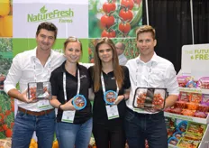 Matt Quiring, Sarah Krzysik, Kara Badder and Conor Chilvers with NatureFresh Farms. Sarah and Kara show the World’s Smallest Tomatoes while Matt and Conor show a new premium black label for cherry tomatoes on the vine. Two more items for the black label are in the works and will be launched at PMA.