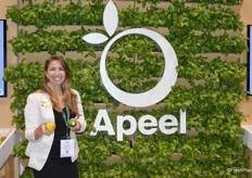 Natalie Shuman with Apeel shows untreated versus Apeel-treated citrus.