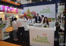 The Fruit Masters stand, preparing for the day.