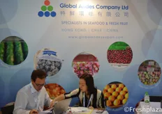 Luis Chadwick Fresard and Jessie Chan from Global Andes Company Limited. Busy working in their booth. Their company is focused on importing and wholesaling of fruit and seafood in Hong Kong and China. They import fruits from Chile, Peru, Mexico, Argentina and India.