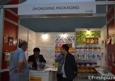 Zhongxing Packaging team together with a client discussing the different packaging options.