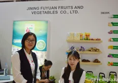 Amy Zhang and her colleague from Jining Fuyuan Fruits & Vegetables Co., Ltd.