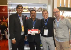 Ajay T G, X, Walo Berger and Marcel Bangerter at the Sam Agri stand, showcasing the packaging of their pomegranate arils.