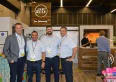 Jamie Moracci, Paul Murracas, Carmine Borrelli and Chris Veillon with Pure Flavor. With an uptick in snacking, the company has many different snacking items on display.