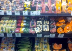 "A great mix of colours - notice yellow and red mini-potatoes on top, four types of corn and carrots (500g). Just like in Coles, producer names are on the packets. Everything is an "Aussie product", i.e. made in Australia."