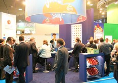 Lots of people in the stand of Enzafruit and Jazz