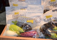 Four different colours of eggplant, in a Pure Flavor packaging