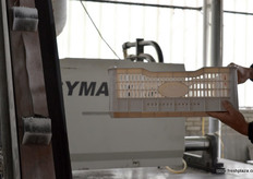 The company uses considerable numbers of white plastic crates for internal and external transport. It therefore has its own crate production line.