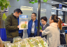 Paul (Yu Xianping), Marketing Manager, explains about the store at Hema, Shanghai.