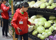 Staff at Hema, Shanghai, are collecting order for online clients. After placing an order online, each clients within a certain area around a Hema store should receive the purchase within 30 minutes, delivered at their door.