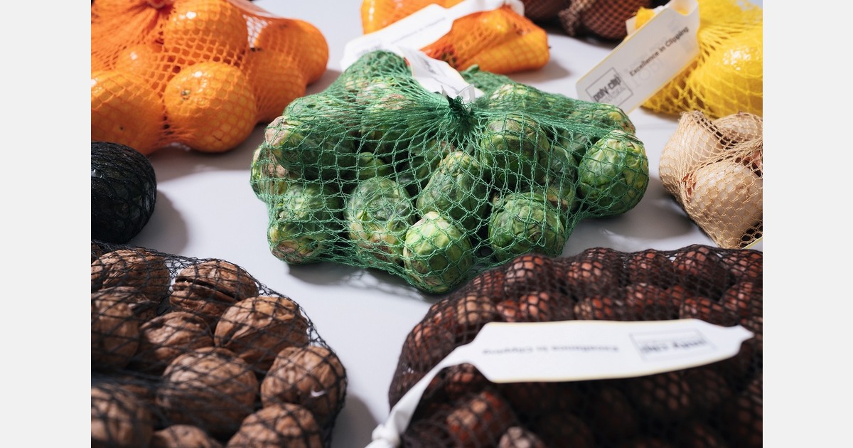 Industrially compostable net packaging system for fruit and vegetables