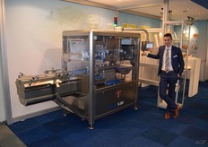 Lourens van Keulen from Tramper Technology with the topseal machine for trays sold at the fair. This machine will be supplied to a Finnish vegetable processing company.