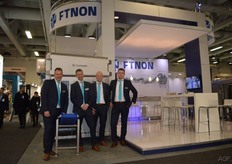 Arno Gaul, Richard van der Linden, Lars Heuvelmans and Joost Lotegrink Bruinenberg from FTNON. The team poses in front of the Coretakr iceberg de-coring machine, which can process 1,800 iceberg lettuces per hour. The machine saves 5,5 FTE and digitises the process by measuring and recording the quality of the product. A scan is made using five cameras that decide the position of the lettuce. These cameras also register colour, shape, firmness of the leaves and the size of the product.
