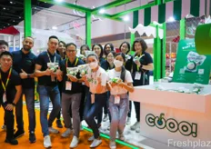 Team photo at Cooo!, a brand of Kingo Fruits. Fresh coconut water in the original coconut was a new trend at the show. This version is from Kingo Fruits under the brand name Cooo!.