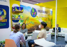 Business conversations at the stand of Frutadeli from Ecuador.