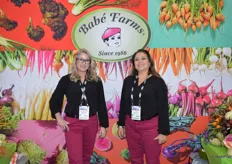 It’s always colorful in the booth of Babé Farms. Ande Manos and Rocio Munoz talk with show attendees about the company’s California grown vegetable programs.