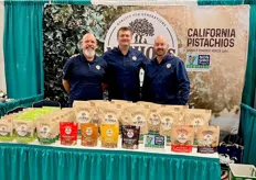 Roman Sowala, Jeffrey Nichols, and Jared Lorraine with Nichols Farms have a variety of organic pistachios on display.