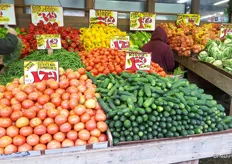 It was explained that this high-volume low-cost model appeals to the area's diverse demographic. Plum tomatoes and bananas are the two top sellers here.