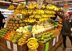 The tropical island, with many colorful fruits on display, including Ecuadorian yellow and pink dragon fruit, several mango and plantain varieties, along with melons, papayas and pineapples.