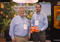 Douglas Feek and Ben Backus from DLF International, holding oranges in a new E-pack, which has 35% less material and is 100% recyclable. The product should be released by the end of 2019.