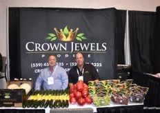 Rob Mathias and T.A. Heckel of Crown Jewels, showcasing the fruit that they will begin harvesting and selling soon.