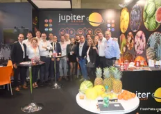 The entire team of Jupiter Group, right before they would start their staff competition of cutting a pineapple.