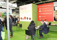 Berry Gardens booth. Procurement Director Stephen Swainston busy with a business meeting