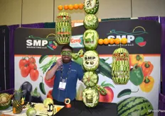 Patrick O’Brien, the fruit carving ninja, working in the SMP Marketing Booth to create a beautiful display out of watermelons.