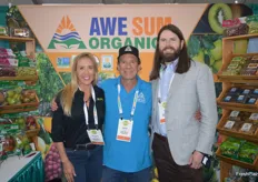 The Awe Sum Organics team is happy to be at OPS, which is located in their backyard. Brianna Posner, David Posner and Guy Opie smile for the camera. 