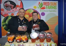 Showing Sweetpops in different packaging formats are Tom Coufal and Ray Mason with Red Sun Farms. 