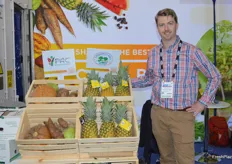 Martin Jensen from Chestnut Hill Farms proudly shows pineapples from Costa Rica. 