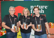 Ray Wowryk, Stephanie Swatkow and Conor Chilvers with Nature Fresh Farms showing different flavor tomato varieties, including Ombre Cherry and Red Cherry.