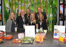 The team from Red Sun Farms in a brand-new booth that resembles a greenhouse. In addition, the booth has lots of educational information included on the side and back. From left to right are Leona Neill, Rob Jackson, Tom Coufal, Nicole Lemming, Harold Paivarinta, and Lynda Mathies.