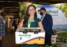 Natasha Smith proudly shows a box of Colombia-grown avocados. According to GreenFruit, they are the only Colombia-grown avos at the trade show. 