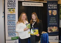 Jodi Green and Denise Briggs with Okanagan Specialty Fruits show Arctic Grannys and Arctic Goldens. Arctic Fujis will be available as of the Fall of this year. 